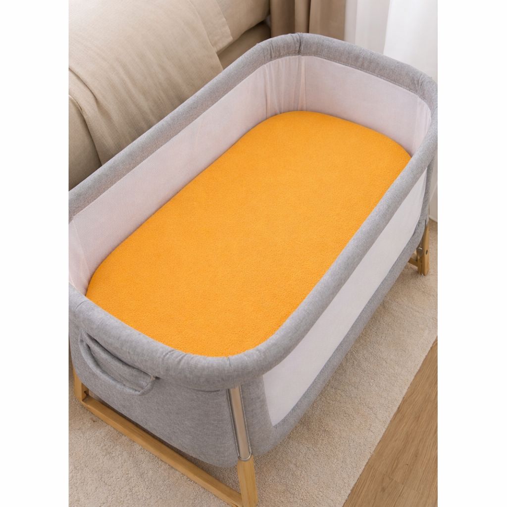 Spannbettlaken oval 40x70 gelb im Kinderwagen und Stubenwagen