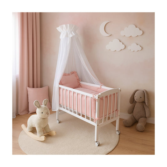 Babybett mit rosa Musselin-Bettwäsche und Rüschen