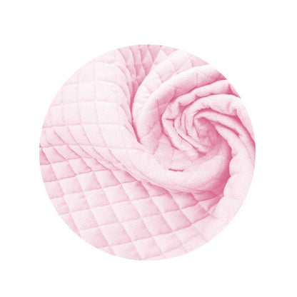 Detailansicht gesteppter Samt Stoff in Rosa Bettnestchen für Babybett
