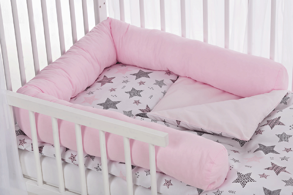 Hausbett mit Rausfallschutz Komplett Sterne rosa - babyhafen.de 