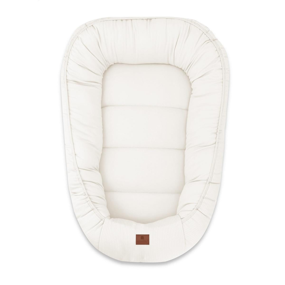 Ein weicher, hochwertiger Baby-Kokon aus 100 % natürlicher Baumwolle – ideal für sicheren, komfortablen Schlaf ab den ersten Lebenstagen.