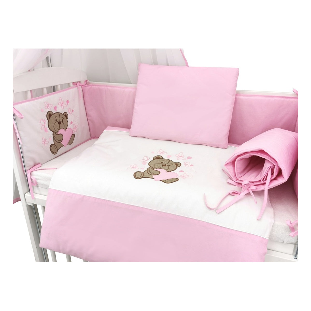 Kinderbett in Weiß mit rosa Nestchen und Teddybär